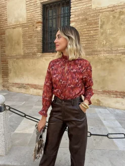 Blusa lurex cuello fruncido caldera